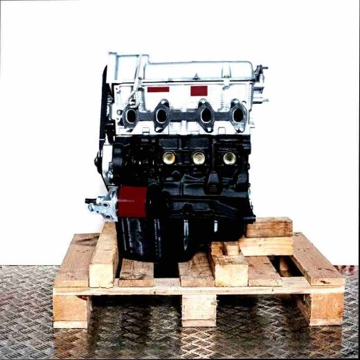 Engine 188 A4.000 on a wooden pallet against a white background. The image showcases the silver upper and black lower parts of the engine.
