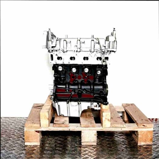 Engine 263 A3.000 on a wooden pallet against a white background. Side view of the engine, featuring a silver upper part and a black block.
