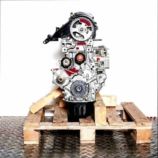 Side view of engine with code 3WZ-TV (DV6FDU) on a wooden pallet against a white background. The engine, with a gray metal finish, is fully visible.