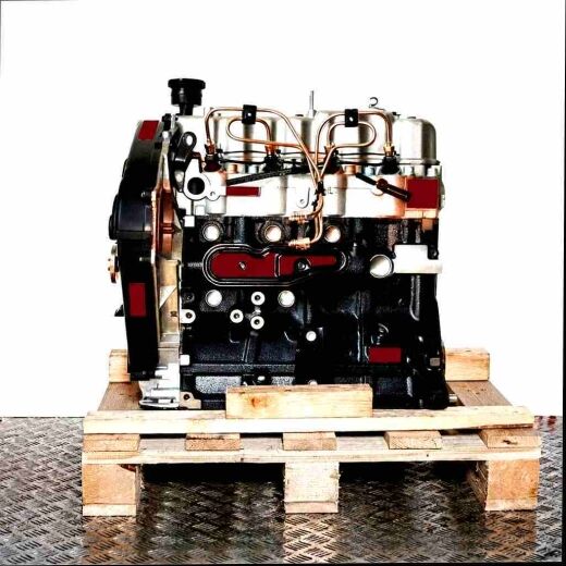 4D56-T engine on wooden pallet against a white background. Side view of the engine, perfect for parts and repairs.