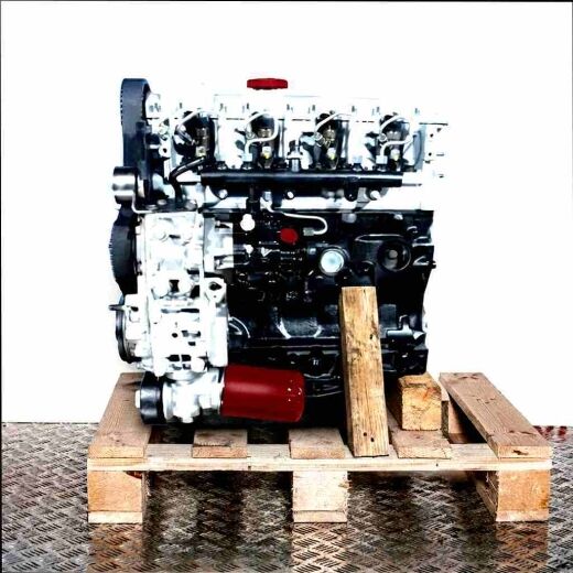 Side view of engine with code 8140.43S on a wooden pallet against a white background. The engine is vertically oriented.