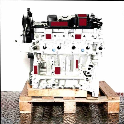 Engine 9HD (DV6CTED) on a wooden pallet against a white background. Side view of the engine, no watermarks or logos.