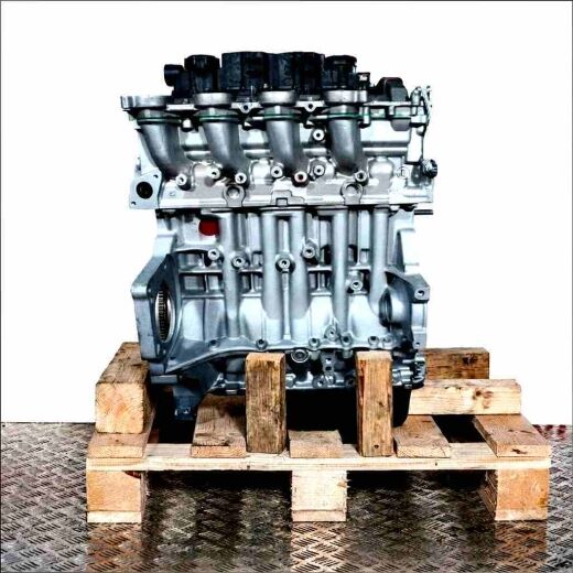 Side view of engine 9HY (DV6TED4) on a wooden pallet against a white background. The engine is vertically oriented.