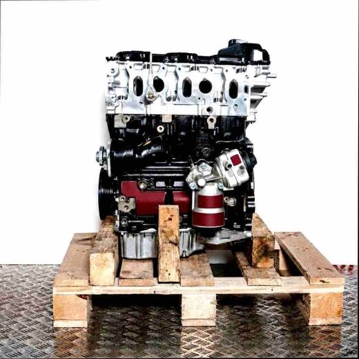 AGZ engine on a wooden pallet against a white background. The black and silver engine is shown from the side.