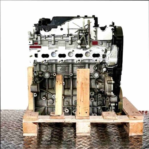 Side view of an AHW (DW10FC) engine on a wooden pallet against a white background. The engine is made of metal and black components.