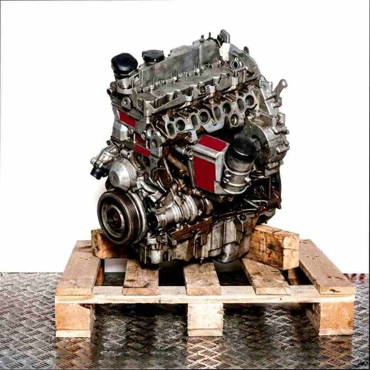 B47 D20 B engine on a wooden pallet against a white background. Side view of the engine, slightly angled.