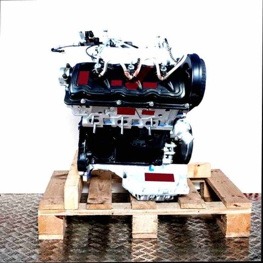 BCZ engine on a wooden pallet against a white background. The black and silver engine, featuring a black valve cover, is viewed from the side.