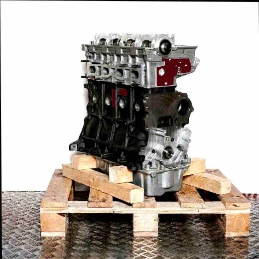 BDJ engine block in grey and black on a wooden pallet against a white background. Side view, vertically aligned.
