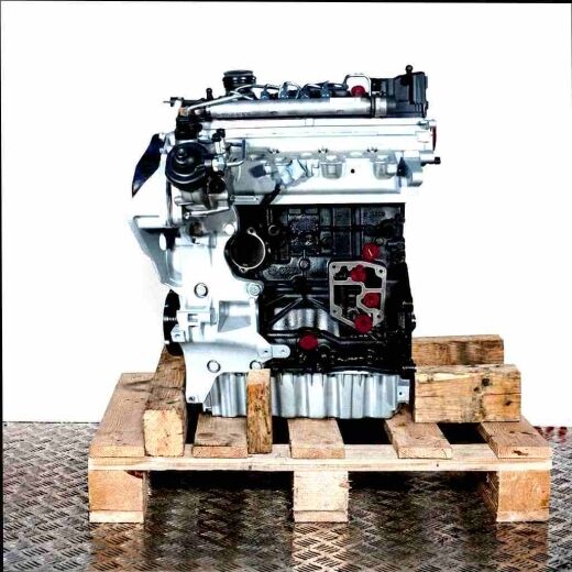 BKP engine on a wooden pallet against a white background. Side view of the black and silver engine with yellow accents.