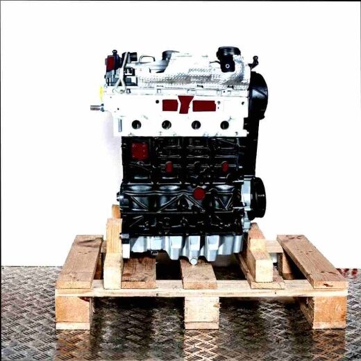 BMN engine on a wooden pallet against a white background. The black and silver engine with yellow accents is vertically oriented.