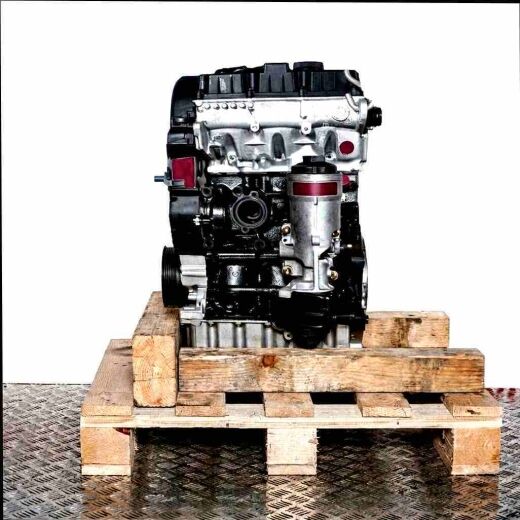 BNV engine on a wooden pallet against a white background. The engine, featuring black and silver components and a gray oil pan, is viewed from the side.