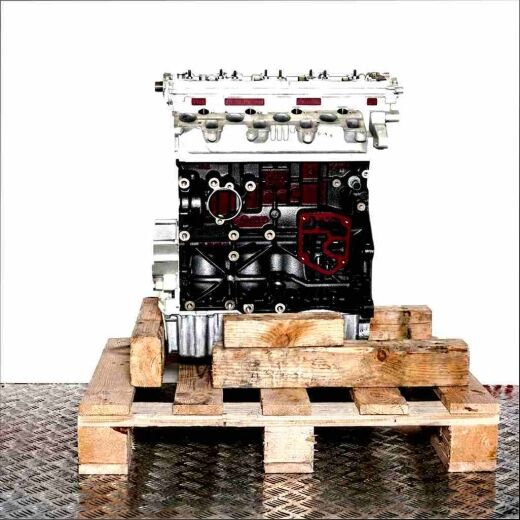 BRF engine on a wooden pallet against a white background. The silver cylinder head and black engine block are visible.