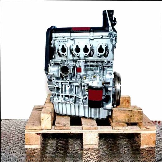 Side view of a BSE engine on a wooden pallet against a white background. The engine is vertically oriented.