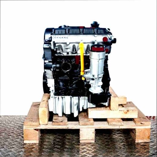 Side view of a BSS engine on a wooden pallet against a white background. The engine displays various parts and connections. Ideal for technical documentation.