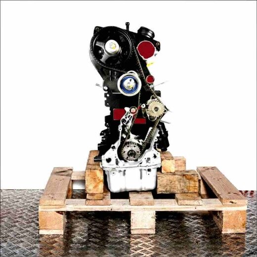 CDLG engine on a wooden pallet against a white background. Side view of the modern four-cylinder engine, showcasing the timing belt. Fully visible engine.