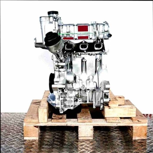 CEVA engine on a wooden pallet against a white background. The silver engine with black components is viewed from the side.