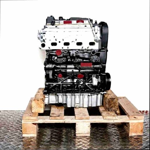 Side view of a black and silver CFFE engine on a wooden pallet against a white background. Yellow components are visible.