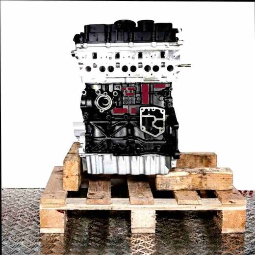Side view of CFJA engine on a wooden pallet against a white background. The silver cylinder head and black engine block are visible.