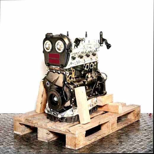CHHC engine on a wooden pallet against a white background. Side view of the engine, slightly angled from below, no watermarks or logos.
