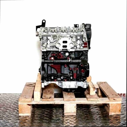 CJSC engine on a wooden pallet against a white background. The black and silver engine is viewed from the side, vertically oriented.