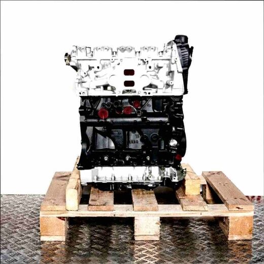 CJXH engine on a wooden pallet against a white background. The silver and black engine with yellow accents is viewed from the side.