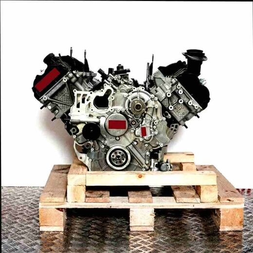 CLAA V-engine on a wooden pallet against a white background. The engine is fully visible, side view.
