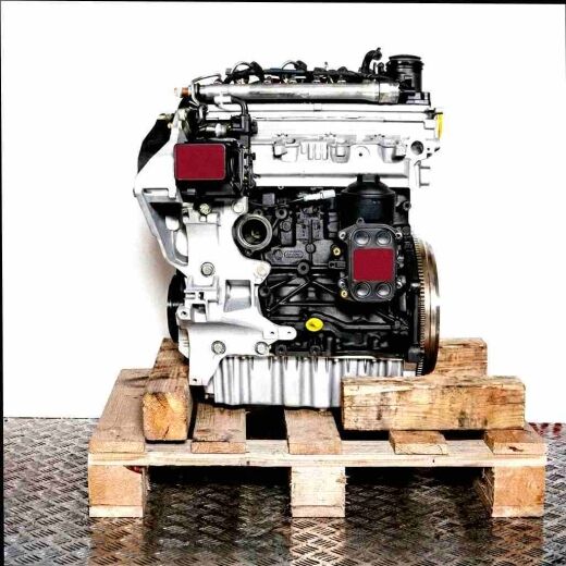 CLNA engine on a wooden pallet against a white background. The silver and black engine with yellow accents is fully visible.