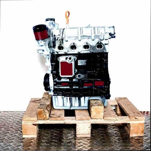 CNWA engine on a wooden pallet against a white background. The engine, partially black and silver, is viewed from the side.