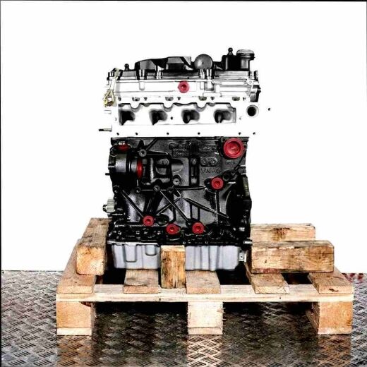 CRKB engine on a wooden pallet against a white background. The engine, with a silver top and black bottom, features yellow caps and screws.