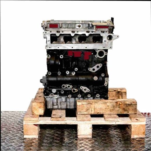 Side view of a CUAA engine on a wooden pallet against a white background. The black and grey engine features intricate details.