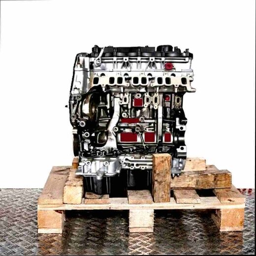 CVR5 engine on a wooden pallet against a white background. Side view of the black and silver engine.