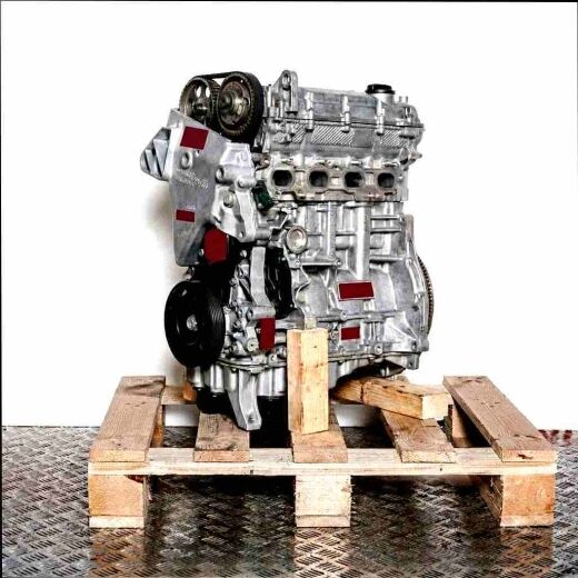 CXSA engine on a wooden pallet against a white background. Side view of the engine, fully visible.