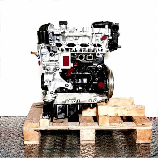 CYMC engine on a wooden pallet against a white background. The silver and black engine is shown from the side.