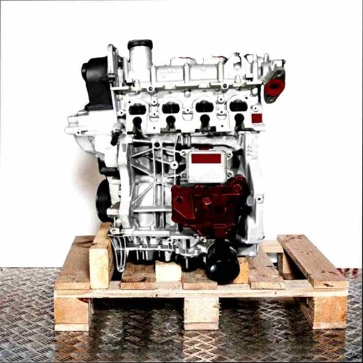 CZEA engine on a wooden pallet against a white background. Side view of the grey and silver engine with black and yellow accents.