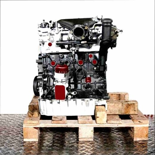 Side view of a D 4204 T engine on a wooden pallet against a white background. The engine features black, silver, and yellow parts.