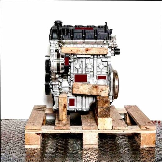 D4HB engine on a wooden pallet against a white background. The black and silver engine is viewed from the side and is vertically aligned.
