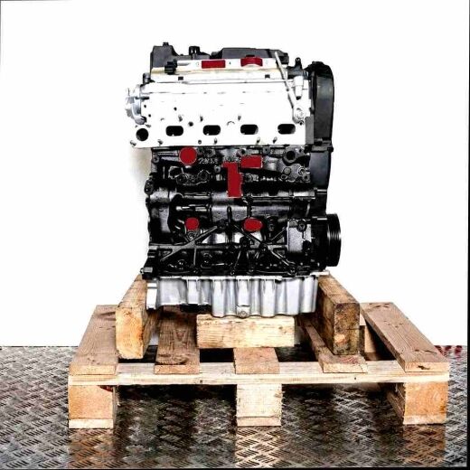 DFLA engine on a wooden pallet against a white background. Side view of the black and silver engine, showing the cylinder head cover.