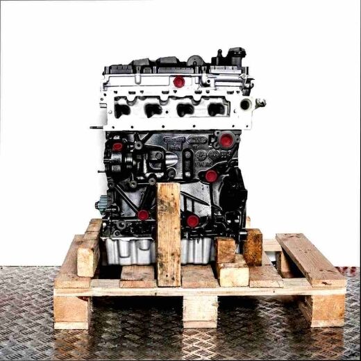 DGTD engine on a wooden pallet against a white background. The gray and black painted engine with yellow markings is vertically oriented.