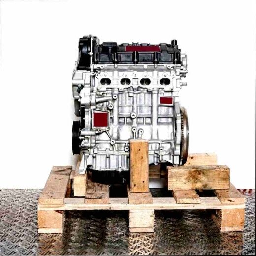 Side view of a DJVA engine on a wooden pallet against a white background. The engine is vertically oriented.