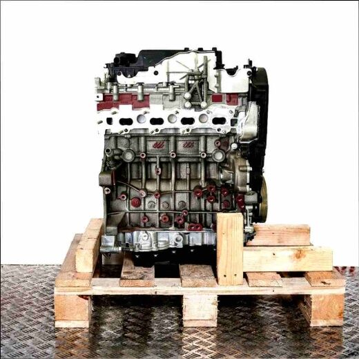 A color image of an EHZ (DW10FC) engine, viewed from the side, resting on a wooden pallet. The white background highlights the engine's components.
