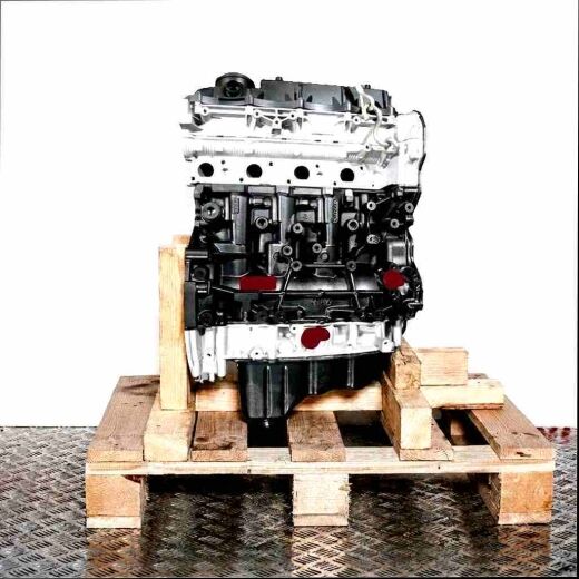 Side view of an ENQJ engine on a wooden pallet against a white background. The black and silver engine with yellow accents and hoses is positioned vertically.