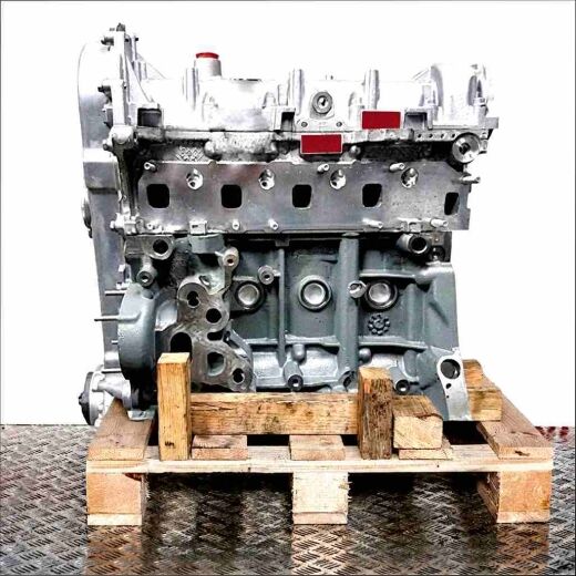 Side view of a silver-gray engine FHY (F13DTE6) on a wooden pallet against a white background. The engine block is positioned vertically, featuring a black oil pan.
