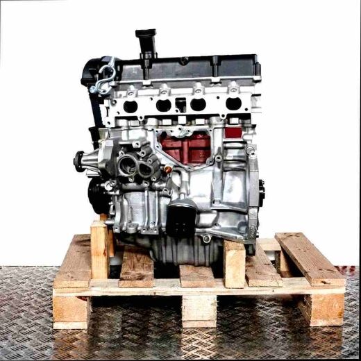 FXJA engine on a wooden pallet against a white background. Side view of the complete engine, clearly visible.