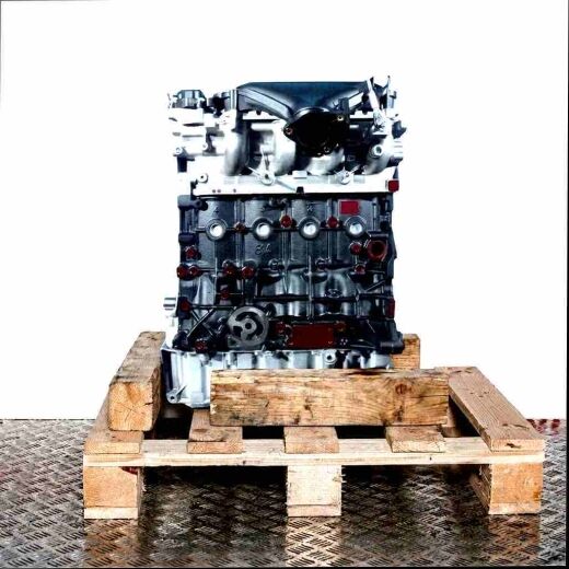 G6DA engine on a wooden pallet against a white background. The engine block is black, with silver components. Side view.