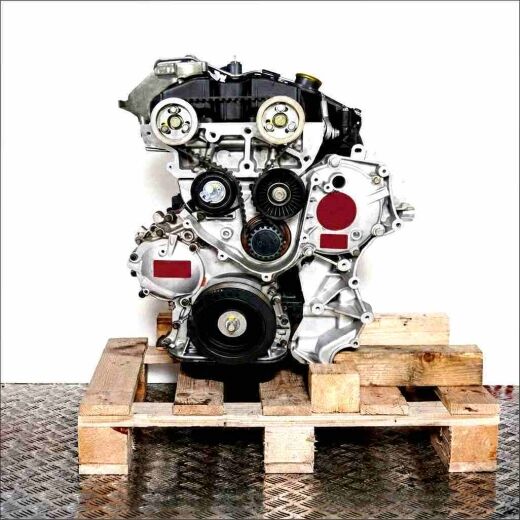Side view of the G9U 650 engine on a wooden pallet against a white background. The image highlights the belt drive and related components.