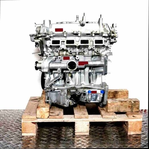 Silver engine H5F 408 on a wooden pallet against a white background. Side view, vertical orientation.