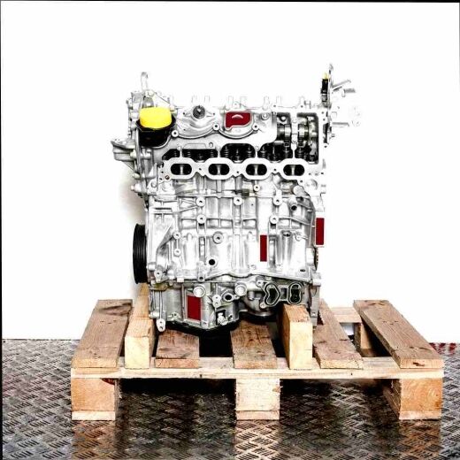Silver engine H5H 450 on a wooden pallet against a white background. The engine is viewed from the side and fully visible.
