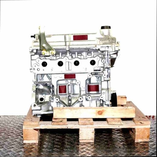HR16DE engine displayed on a wooden pallet against a white background. The engine, primarily silver metal, is viewed from the side.