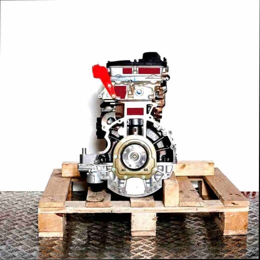 JXFA engine on a wooden pallet against a white background. The side view of the engine showcases detailed mechanical components.