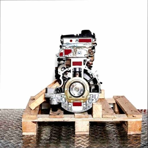 Side view of a JXFC engine on a wooden pallet against a white background. The engine is fully visible.